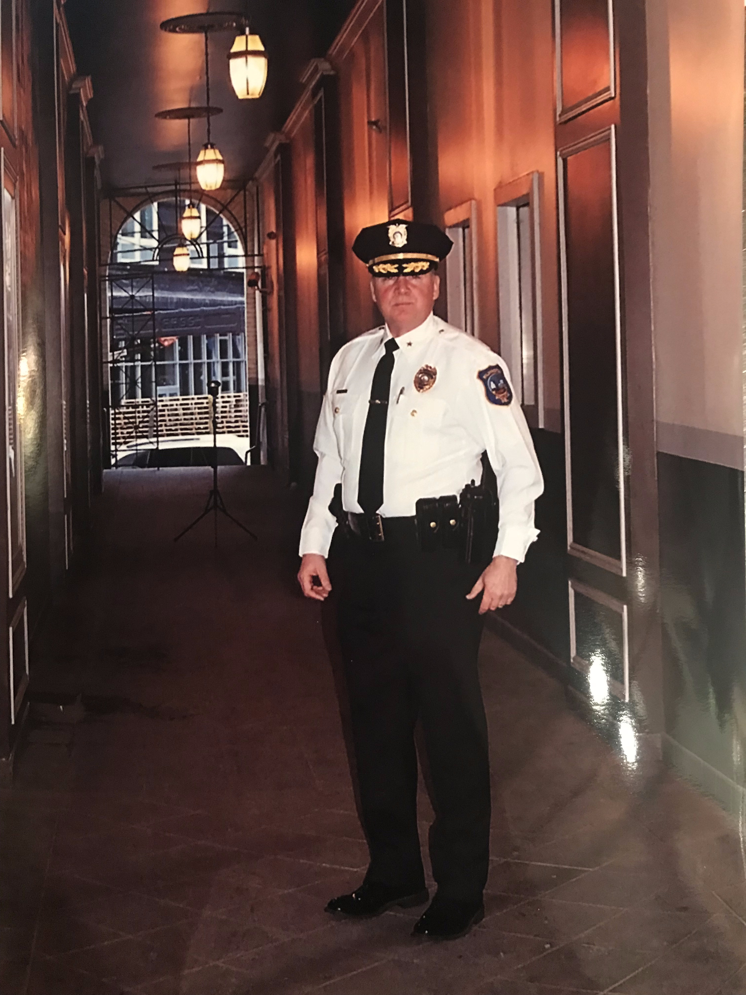 Commissioner Tracy in hallway